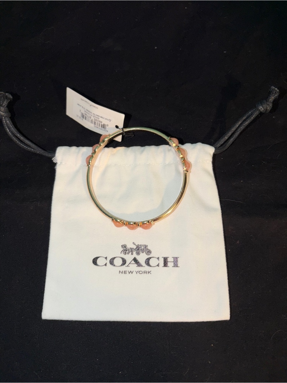 COACH Gold Bracelet with Peach Bead Accents